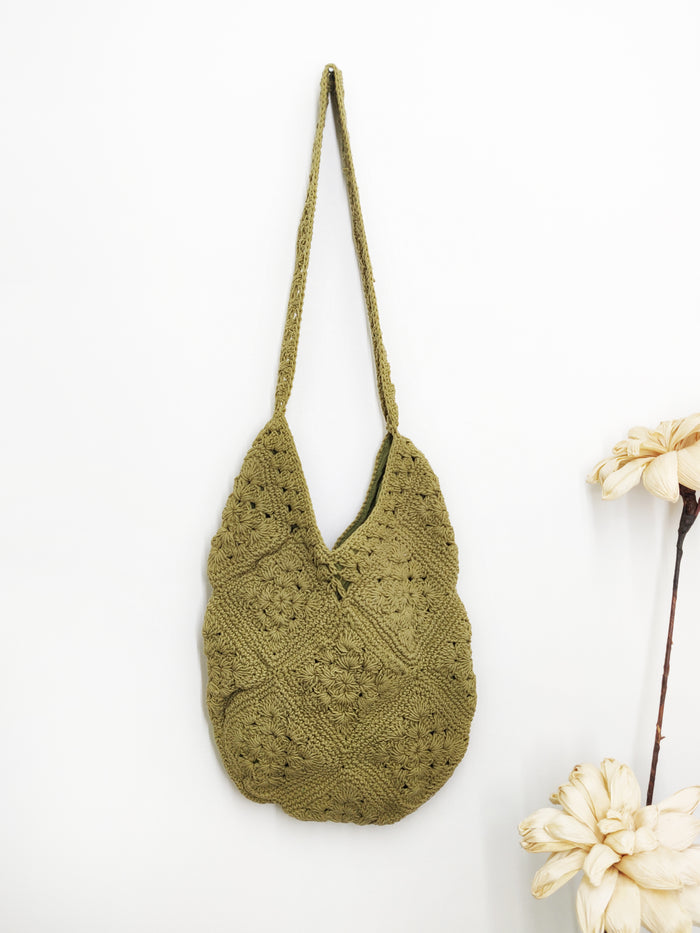 Handmade crochet shoulder bag in green by NIIRA, eco-friendly knitted tote for daily use