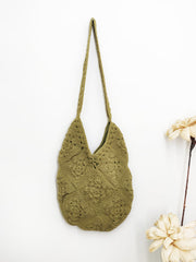 Handmade crochet shoulder bag in green by NIIRA, eco-friendly knitted tote for daily use