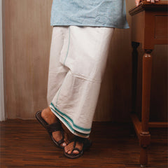 Khaadi lungi in white, pure handwoven khadi cotton by NIIRA