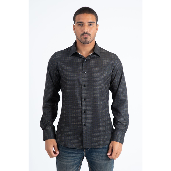 Man wearing a black and multi color long sleeve geometric print button-down shirt paired with jeans, modern men's fashion look- front view