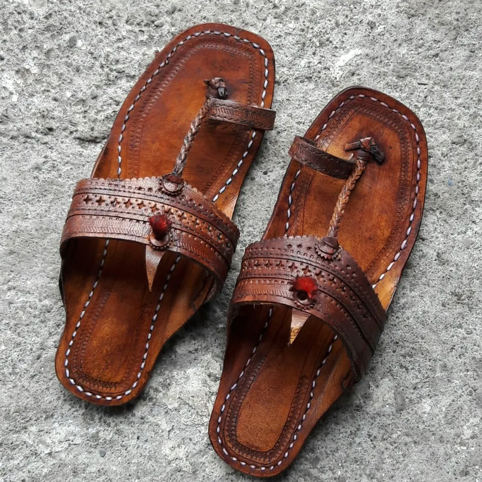 The Classic Kolhapuri chappal for men in handcrafted tan leather with anti-skid sole by NIIRA