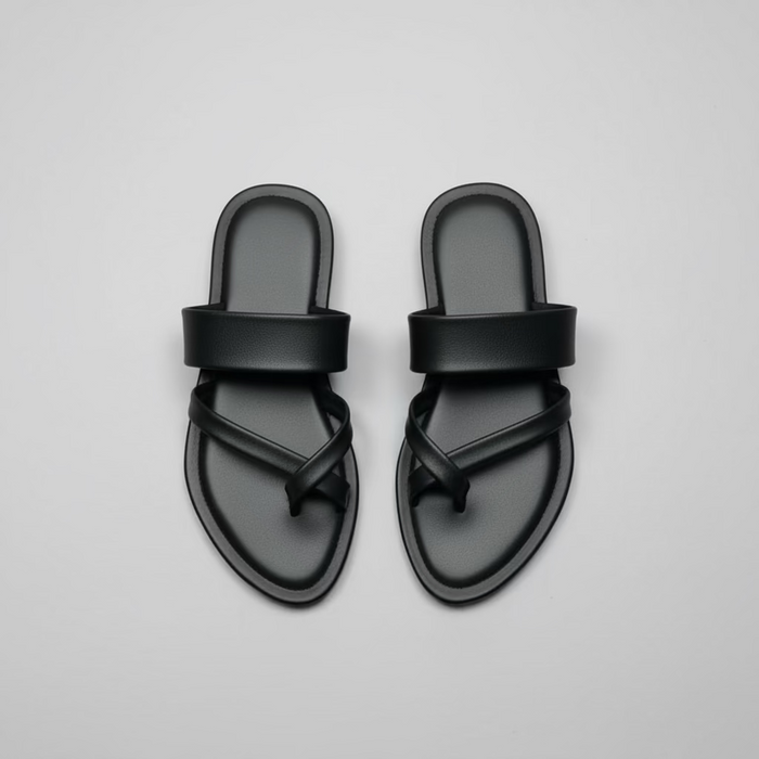 Kaal Angutha Kolhapuri chappal, handcrafted black leather sandal with signature toe-ring by NIIRA