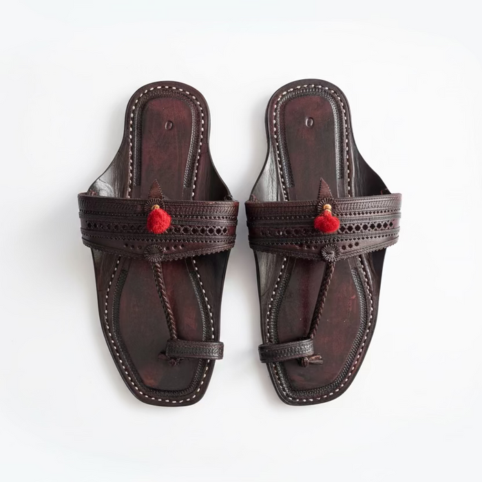The Dark Classic Kolhapuri chappal in black handcrafted leather with anti-skid sole by NIIRA