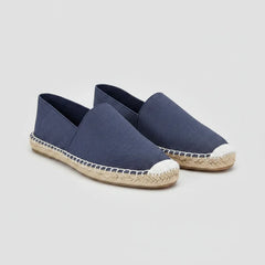 Blue espadrille shoe on a white background