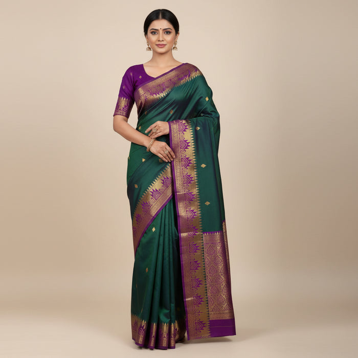 Green and purple saree with a matching blouse on a white background