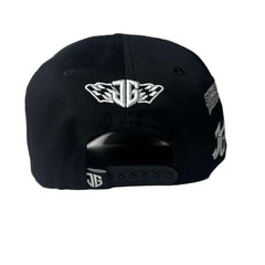 Black cap with white logo on a white background