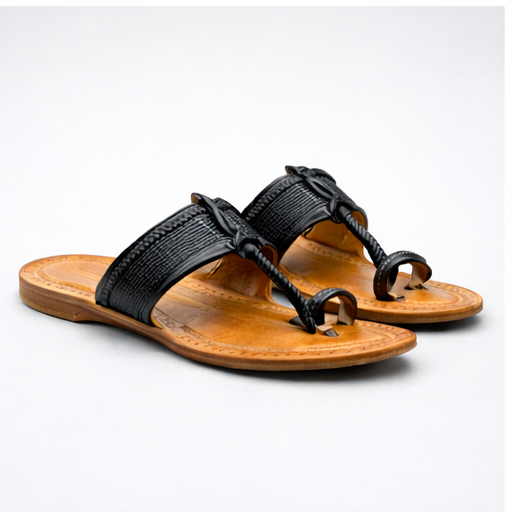 Pair of black sandals with wooden soles on a white background
