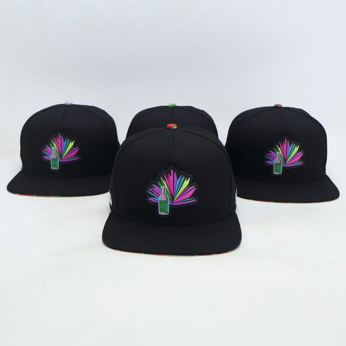VBR Chihuahua Sotol black snapback cap front view with colorful sotol bottle and agave patch